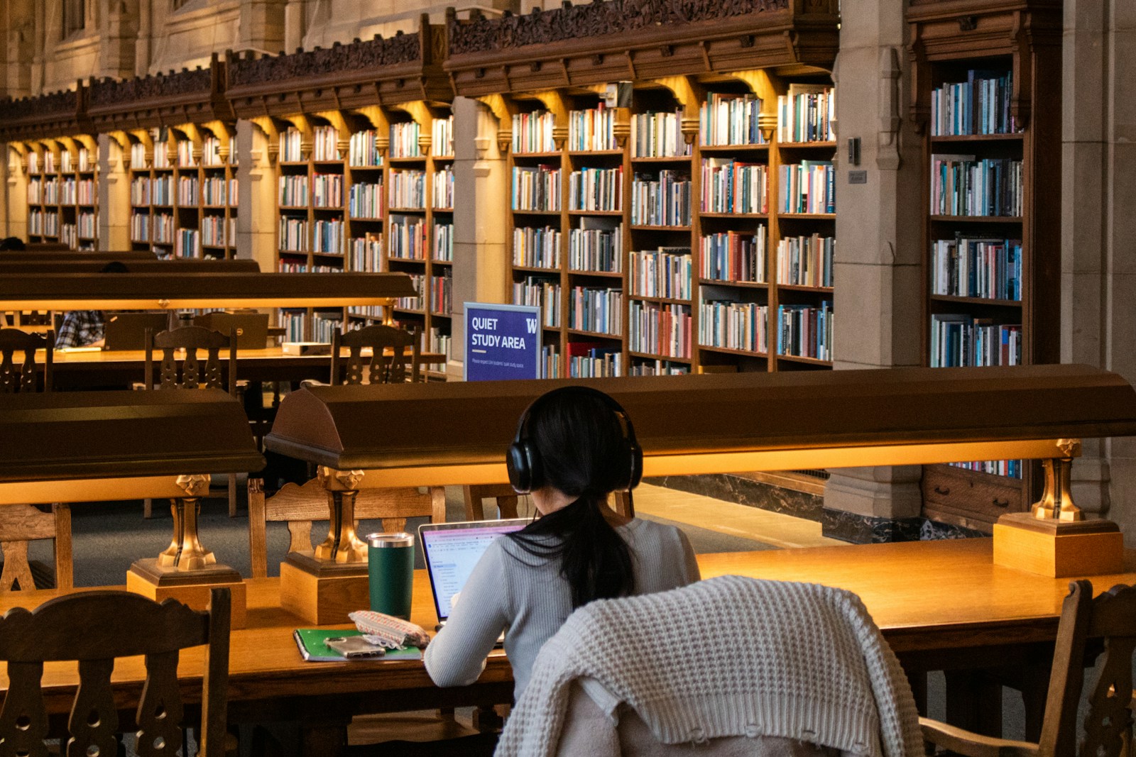 Student preparing for university study in a library
