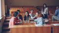 Further education students studying together